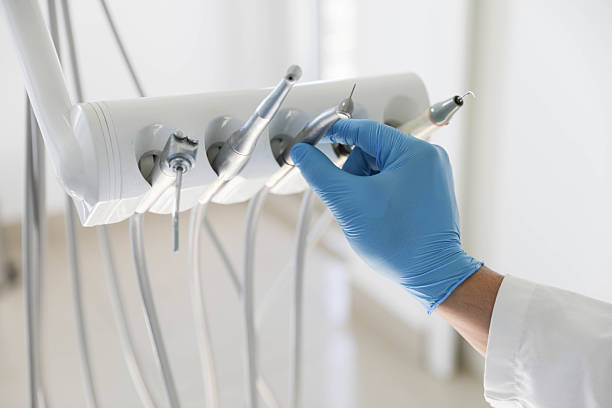 Professional Tooth Extraction technician working in Chesapeake, WV